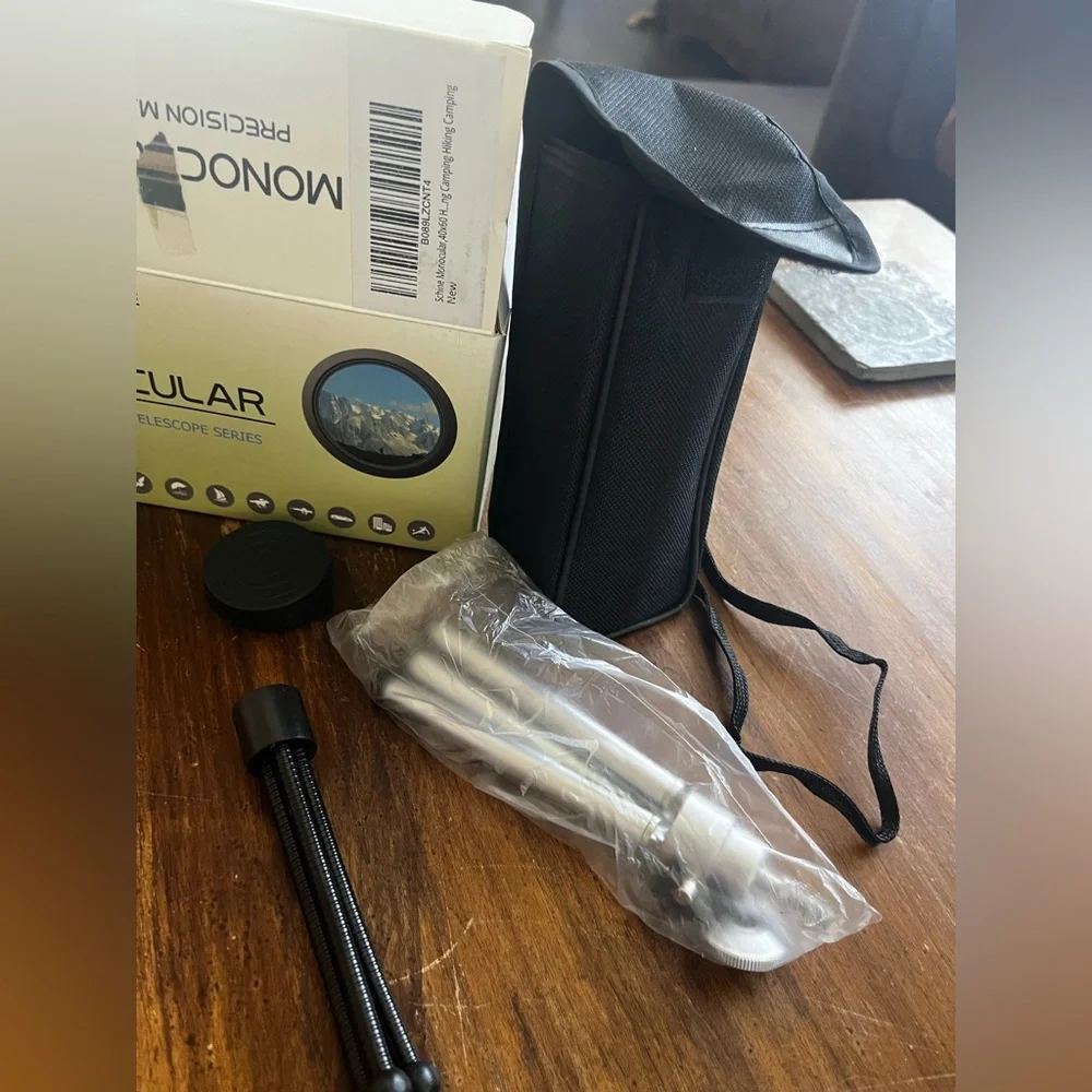 NIB. Monocular. Rigid and flexible tripod attachments.